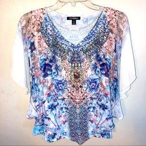 Roz & Ali floral top with flowing white sleeves.